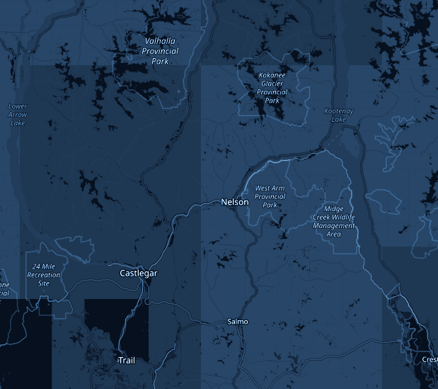 Map of the West Kootenays showing SUMMIT Lighting Systems service area: Nelson, Castlegar, Trail, Rossland, Salmo, Fruitvale, Montrose, Warfield, Slocan Valley and Kaslo BC